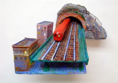train_coming_out_of_a_tunnel